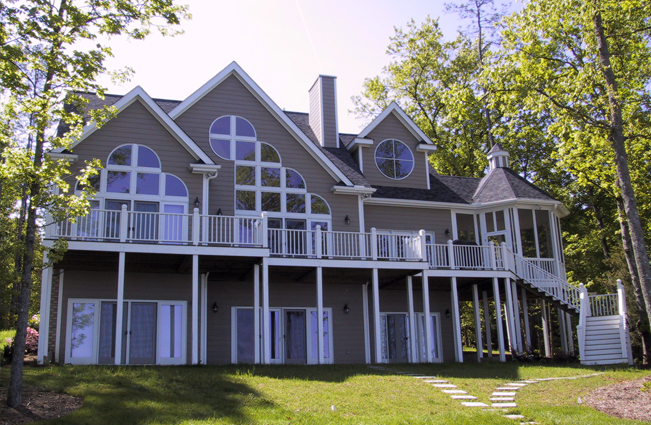 Lakeside house with arched windows