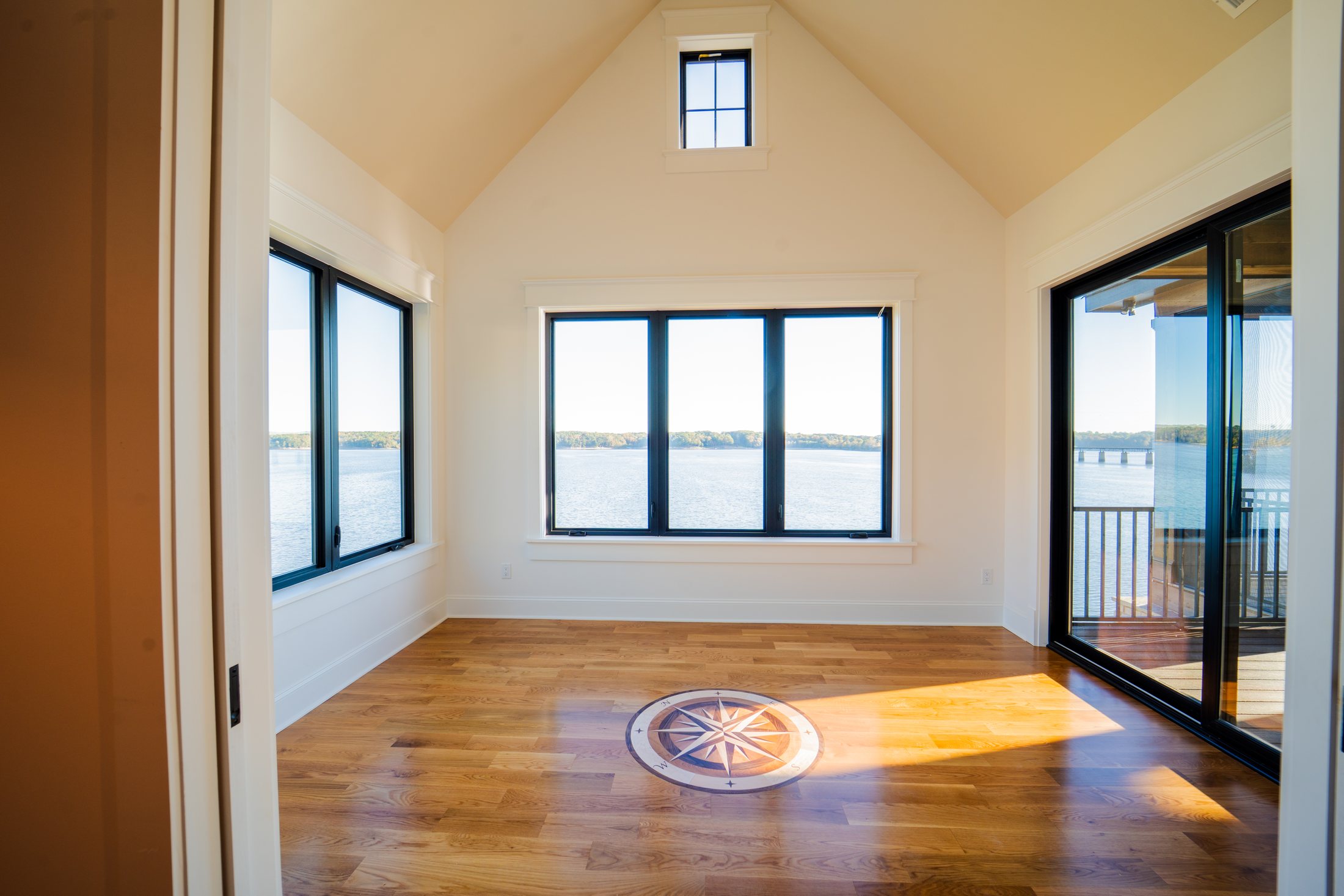 House on the lake room with compass inlay and lake views